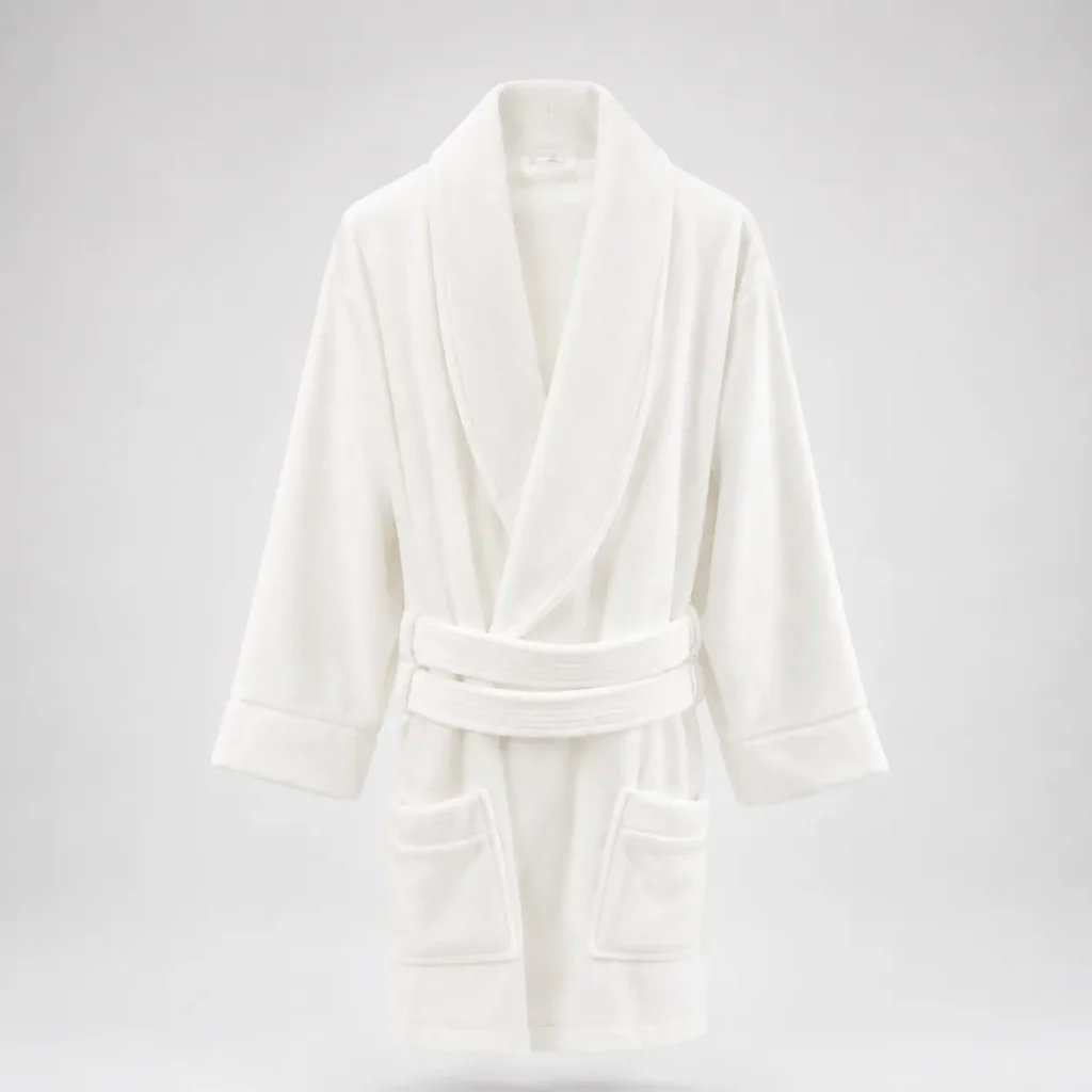 White velour towelling bathrobe with shawl collar, waist belt and two front pockets