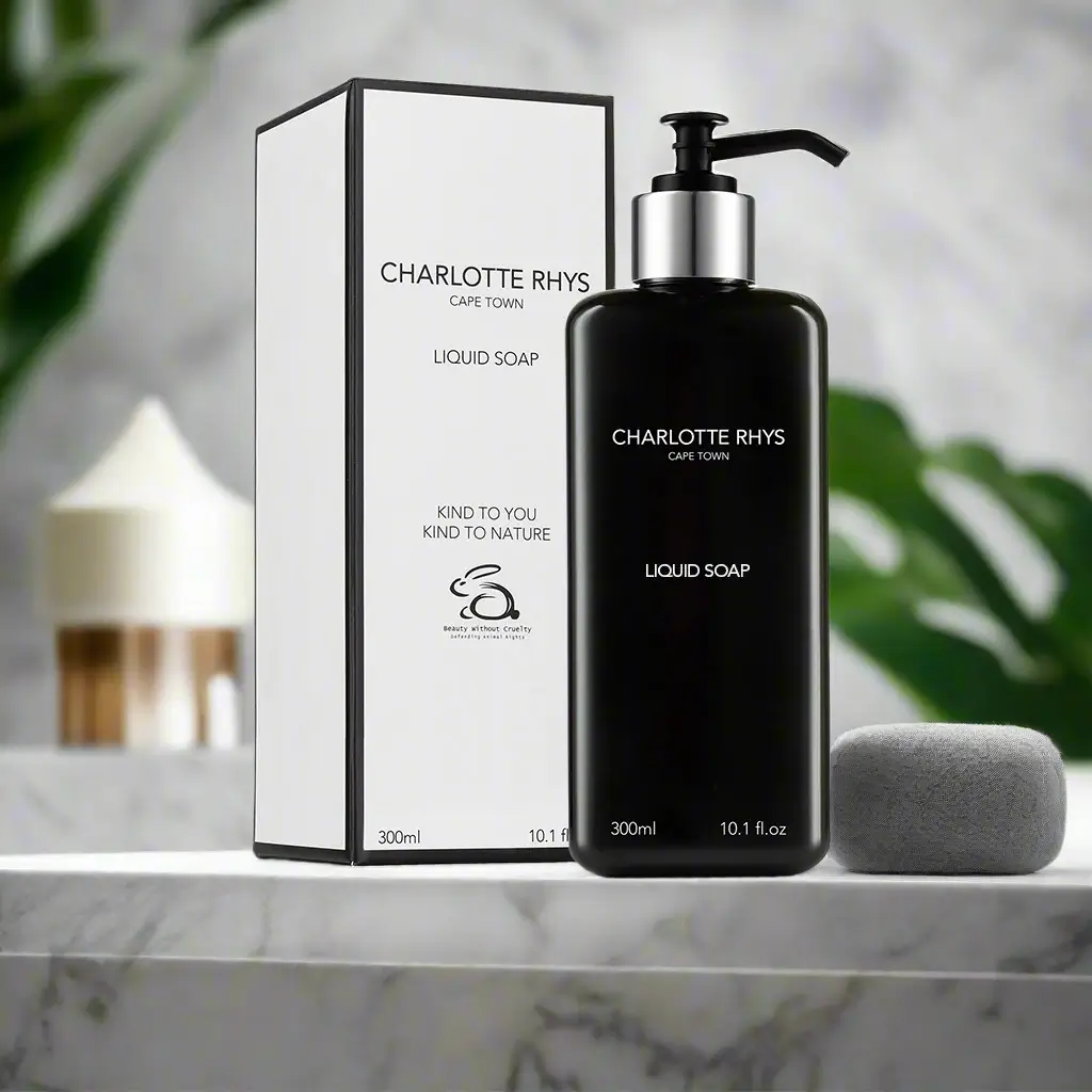 Charlotte Rhys 300ml liquid soap in black pump bottle with branded packaging displayed in a luxury bathroom setting